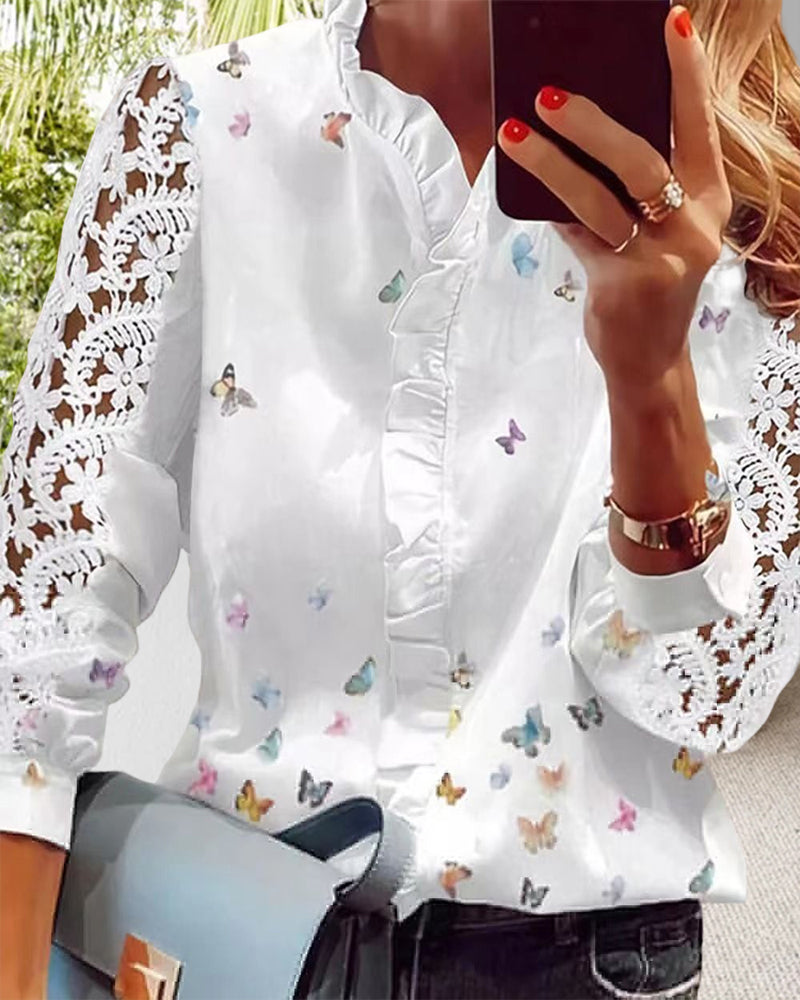 Blus med spetsar med patchworktryck