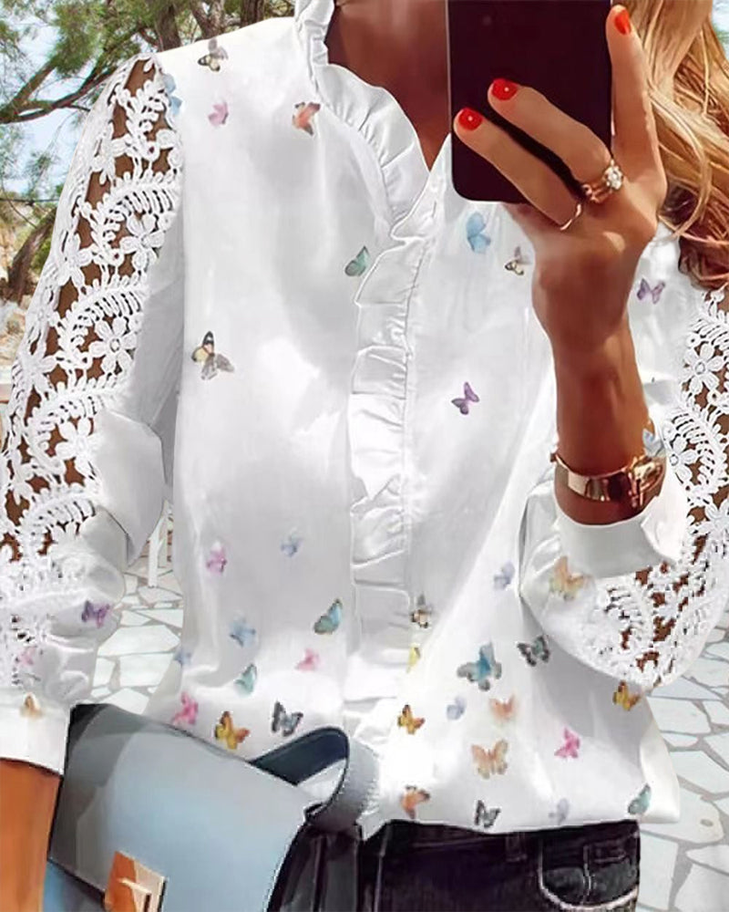 Blus med spetsar med patchworktryck