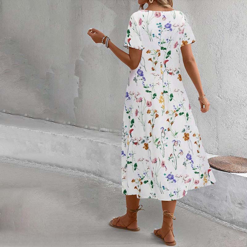 Emma™ – Ledig klänning med blomtryck
