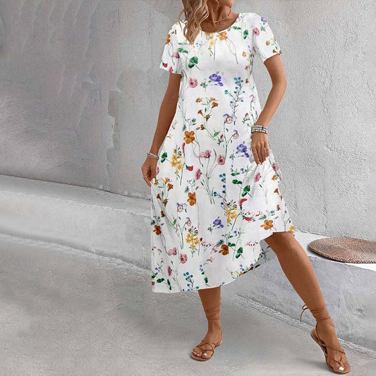 Emma™ – Ledig klänning med blomtryck